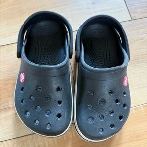 CROCS Kids Black Clogs with Red Logo Accents